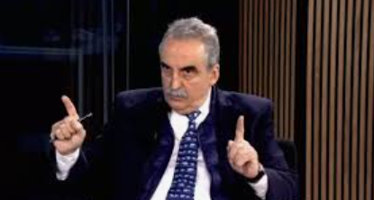 Guillermo Moreno señalando un gráfico de dólar.